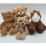 Four plush teddy bears and a horse toy sitting together on a white background