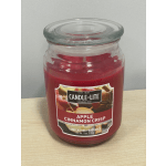 Red apple cinnamon candle in a glass jar
