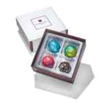 Box of four assorted chocolates in a gift box