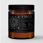 Amber candle in a black-lidded jar with a Virgo label