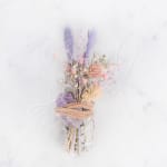 Small pastel dried bouquet with lavender and pink flowers tied with ribbon