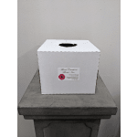 White cardboard florist box with a round opening on top, on a gray wooden stand