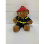 Teddy bear in a red firefighter hat and black uniform