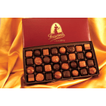 Box of assorted chocolates on gold satin fabric