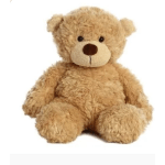 Plush teddy bear sitting on a white background