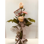 Rose arrangement with a plush bunny and a heart-shaped note