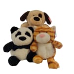 Three plush animals: a dog, panda, and orange cat