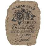 Memorial stone with sunflower design and sympathy text