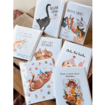 Assorted birthday greeting cards with animal illustrations and playful text