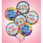 Cluster of colorful Happy Birthday balloons on a pink background