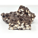 Stacked chocolate bark pieces with marshmallows and nuts