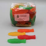 Bag of assorted gummy fish candies with a label on a plain background