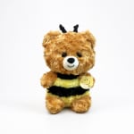 Plush teddy bear dressed as a bee with a "bee well" tag