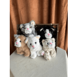 Five plush cat toys in a wicker basket