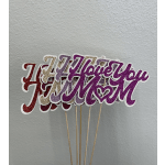 Glittery "I love you Mom" cake topper on sticks