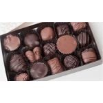 Box of assorted chocolate truffles in dark paper cups