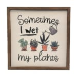 Framed sign with the words "Sometimes I wet my plants" and potted plant illustrations