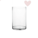 Clear cylindrical glass vase on a white background