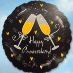 Black anniversary balloon with two champagne flutes and heart accents