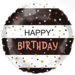 Round birthday balloon with black, white, and confetti dots