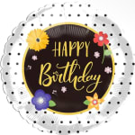 Round birthday balloon with floral accents and polka dots