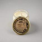 Vanilla latte candle in a glass jar with a gold lid