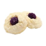 Two white cookies topped with dark berry centers