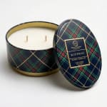 Plaid-lidded blue spruce scented candle in a round tin