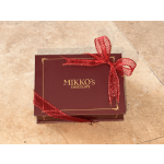 Box of chocolates tied with a red ribbon