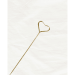 Gold heart-shaped floral pick on a thin stem