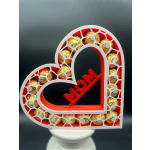 Heart-shaped candy box filled with gold-wrapped chocolates