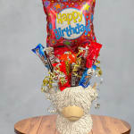 Birthday balloon and candy bouquet in a llama-shaped container