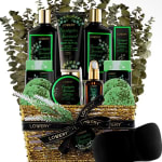 Bath and body gift basket with eucalyptus-themed products and a black ribbon
