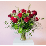 Bouquet of red roses in a clear glass vase