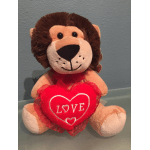 Plush lion holding a red heart with the word LOVE