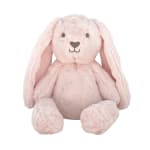 Light pink plush bunny with floppy ears sitting against a white background