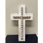 Rustic white wooden cross with a row of beige beads