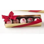 Box of assorted chocolate truffles tied with a red ribbon