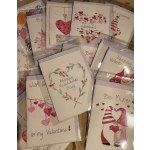 Valentine greeting Card 6" x 4.5". Local artist hand painted watercolor graphics will vary. We will relay your message inside blank card.