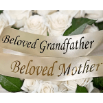 White roses with memorial ribbons reading Beloved Grandfather and Beloved Mother