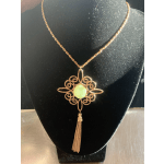 Light green and gold pendant with tassel