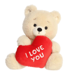 Plush teddy bear holding a red heart with "I LOVE YOU" text