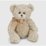 Cream-colored teddy bear with a satin bow