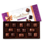 Box of assorted caramel chocolates in purple and gold packaging