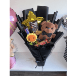 teddy bear, balloon, assorted sweets, crocheted sunflower