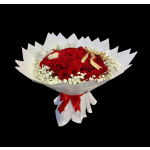 Bouquet of red roses with white baby's breath and a gold ribbon