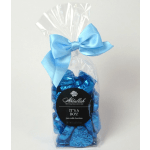 Bag of blue-wrapped chocolates with a blue bow