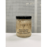 Jar of body sugar scrub with a black lid
