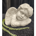 White angel statue with small green floral garlands