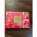 Godiva assorted chocolate gift box with a pink ribbon